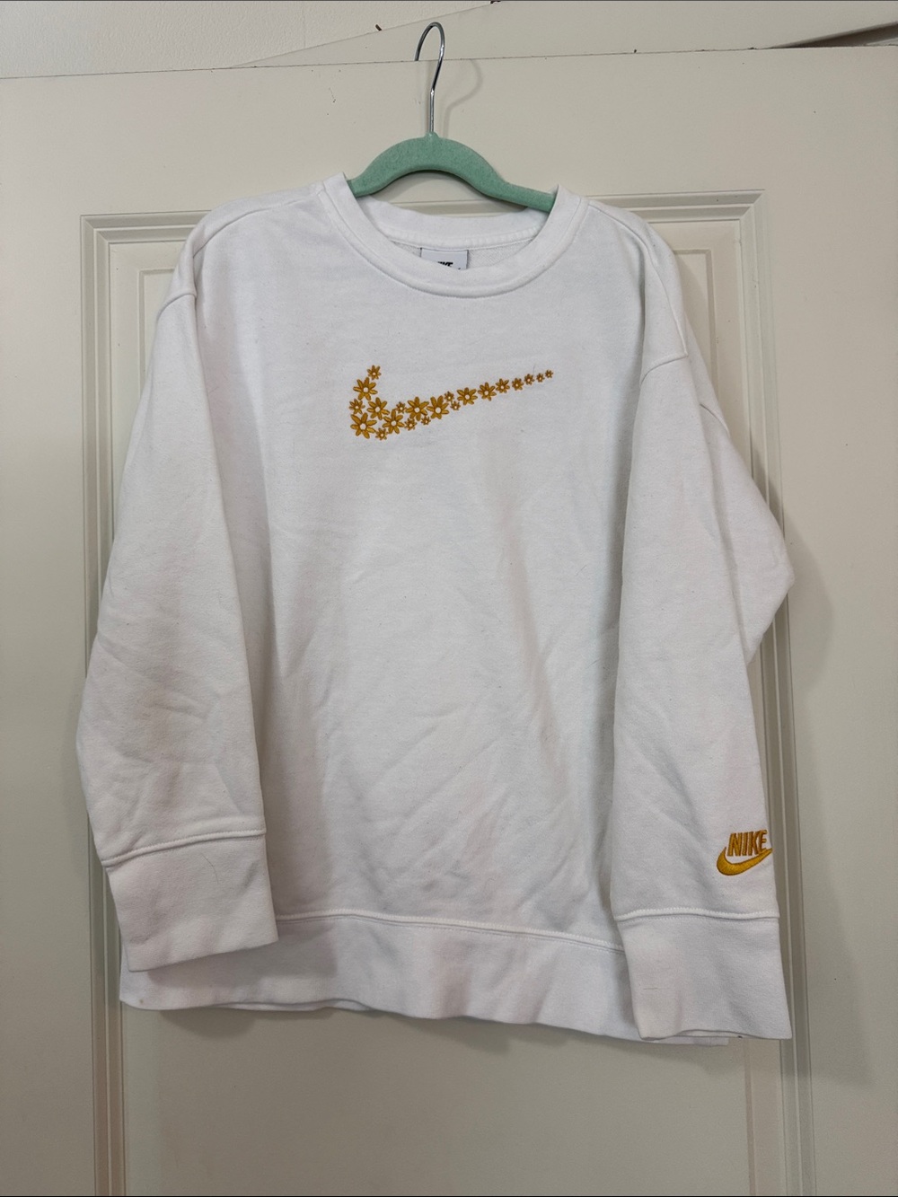 Nike White Crew Sweatshirt with Gold Floral Swoosh